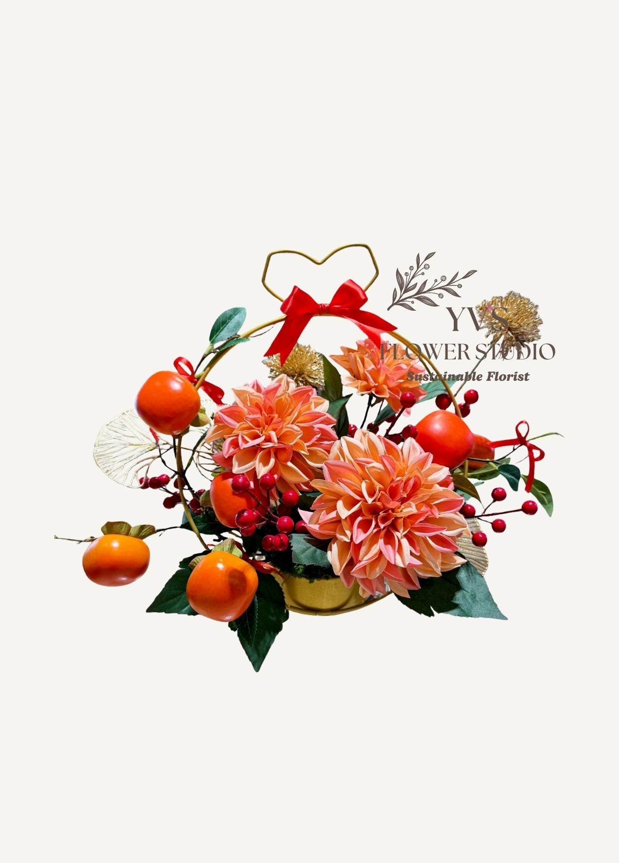 Chinese Lunar New Year arrangement in gold coloured container, Featuring vibrant persimmons, delicate orange dahlias, and cheerful red berries