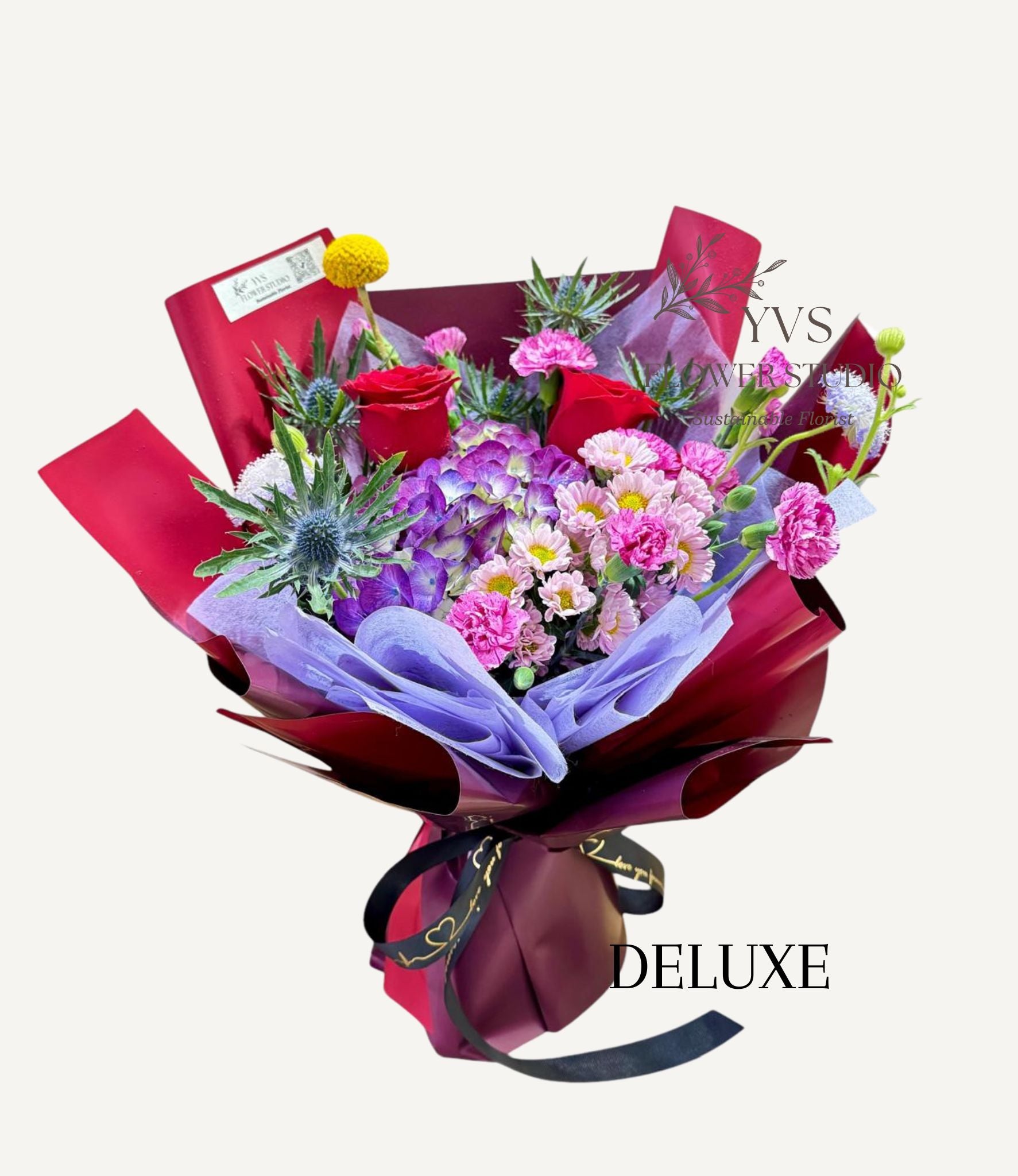 Vibrant themed hydrangea bouquet in two tone red wrapper