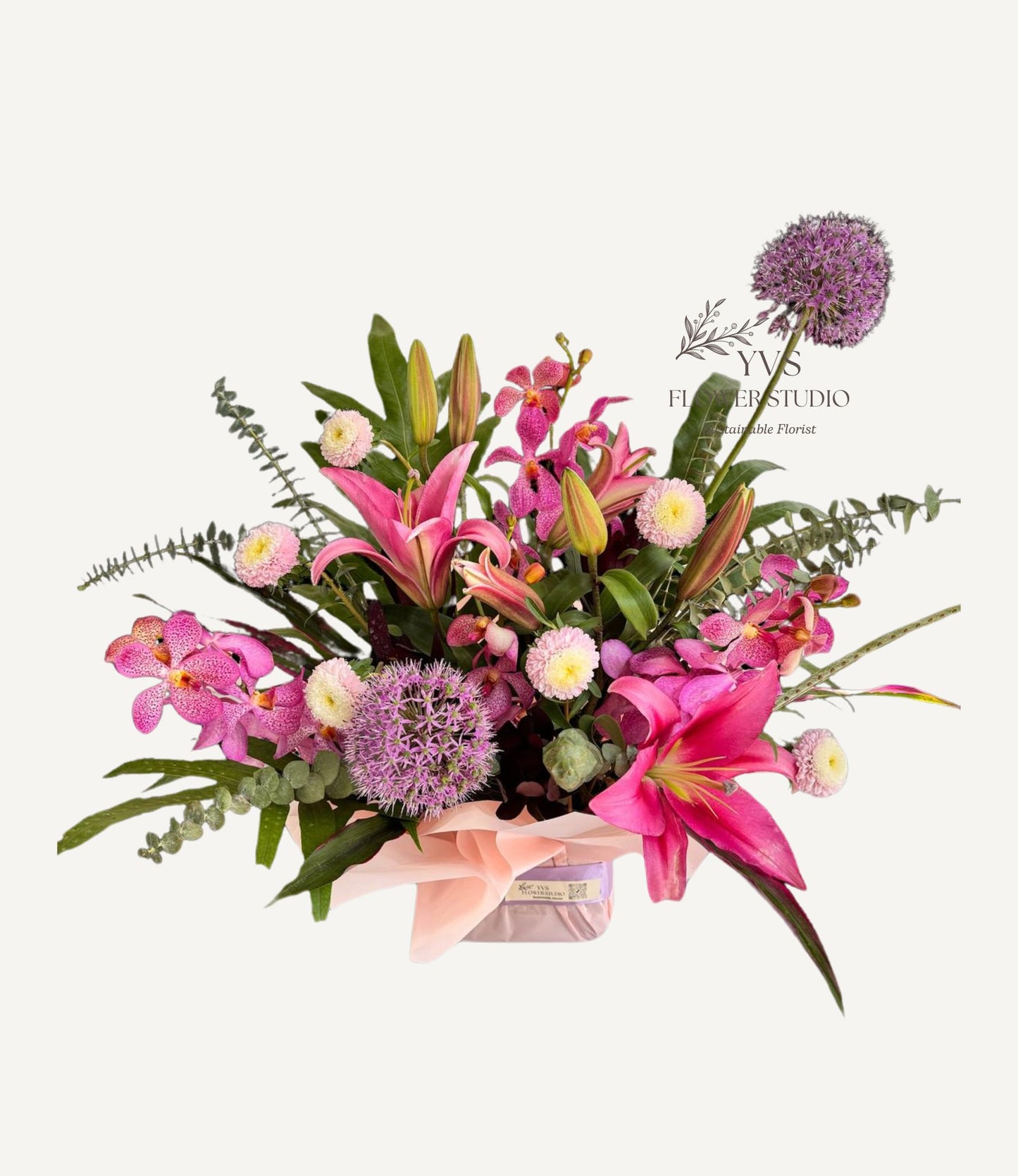 Congratulatory table flowers with lilies and orchids