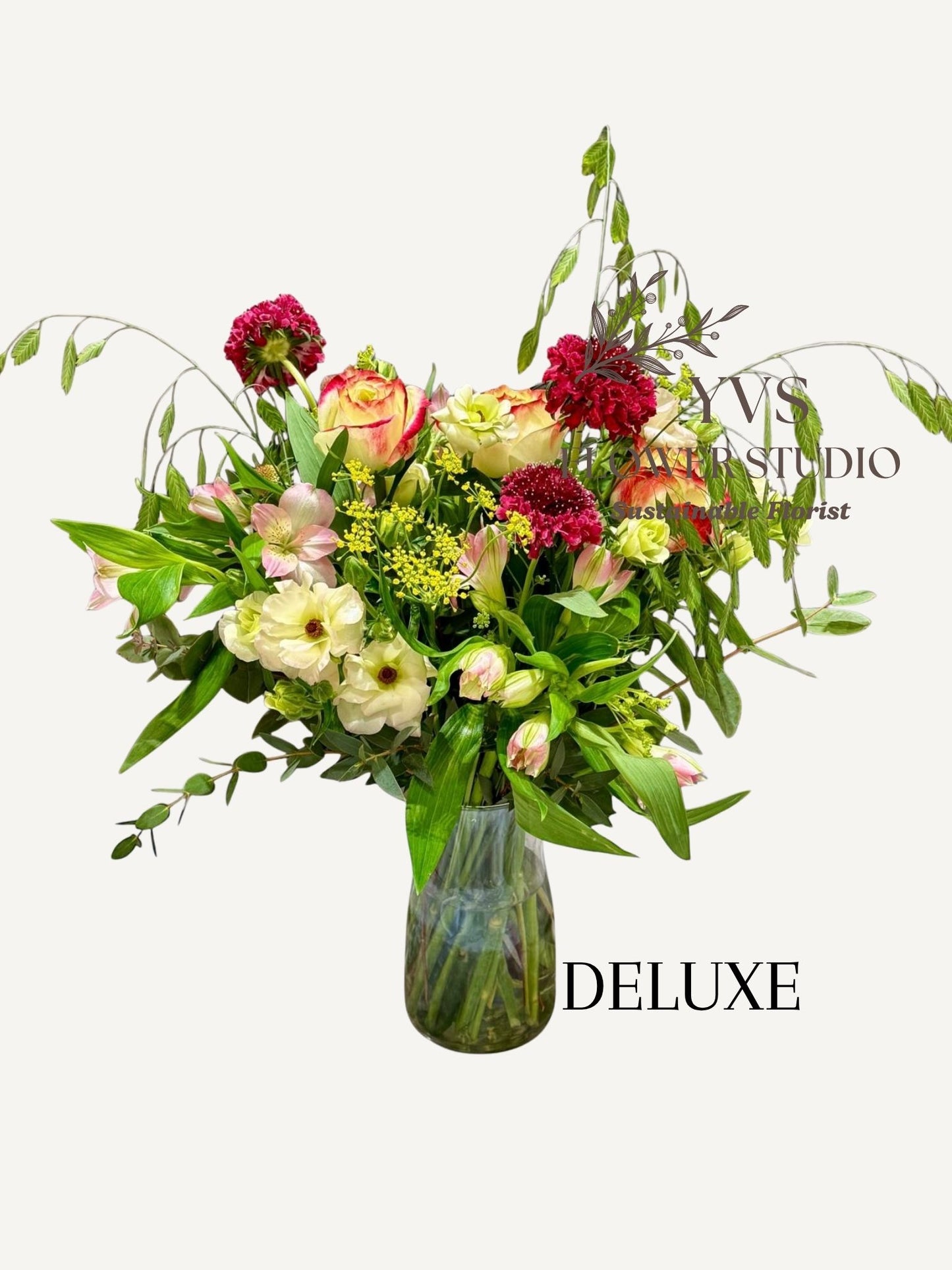 spring flowers in a clear vase