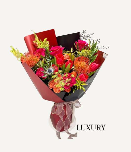 Luxury Designer's choice vibrant red bouquet