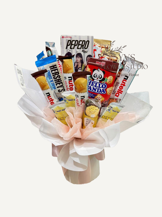 Bouquet of snacks including candy bars and chocolates