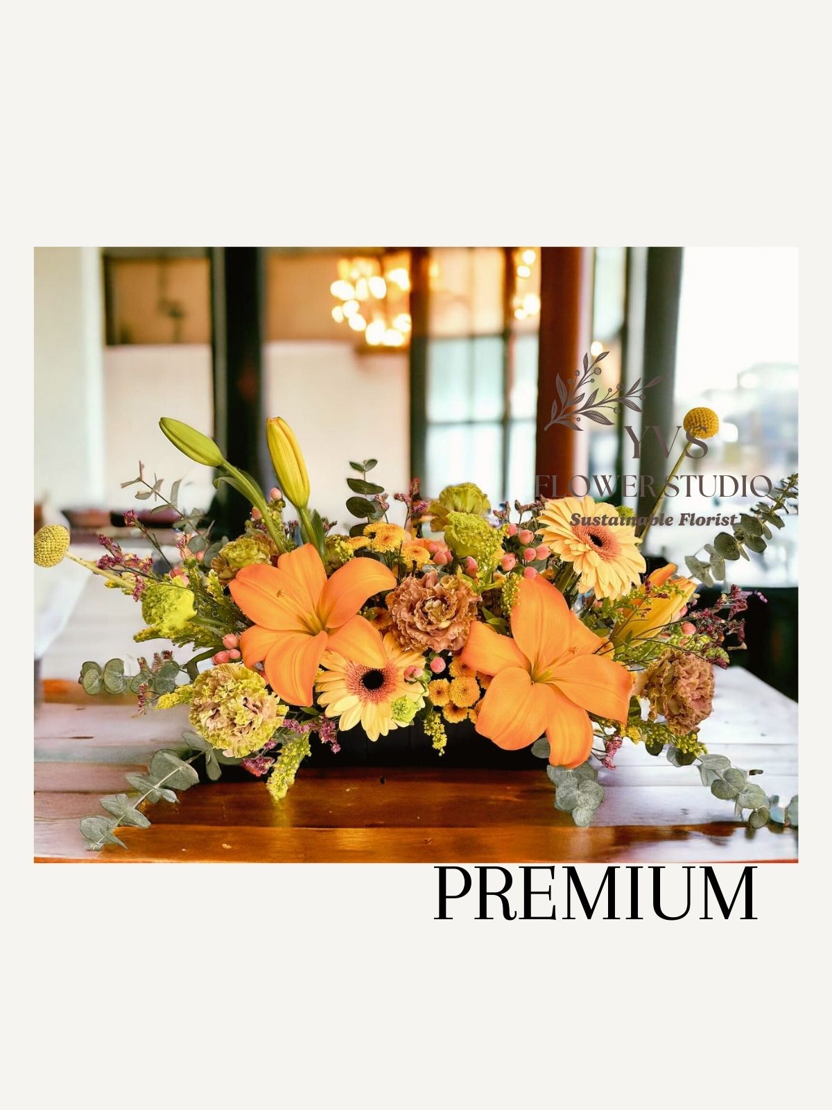 Premium Yellow and Orange Designer's Choice Table Arrangement